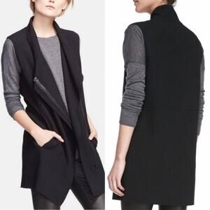 Vince asymmetrical wool vest with leather trim on zipper